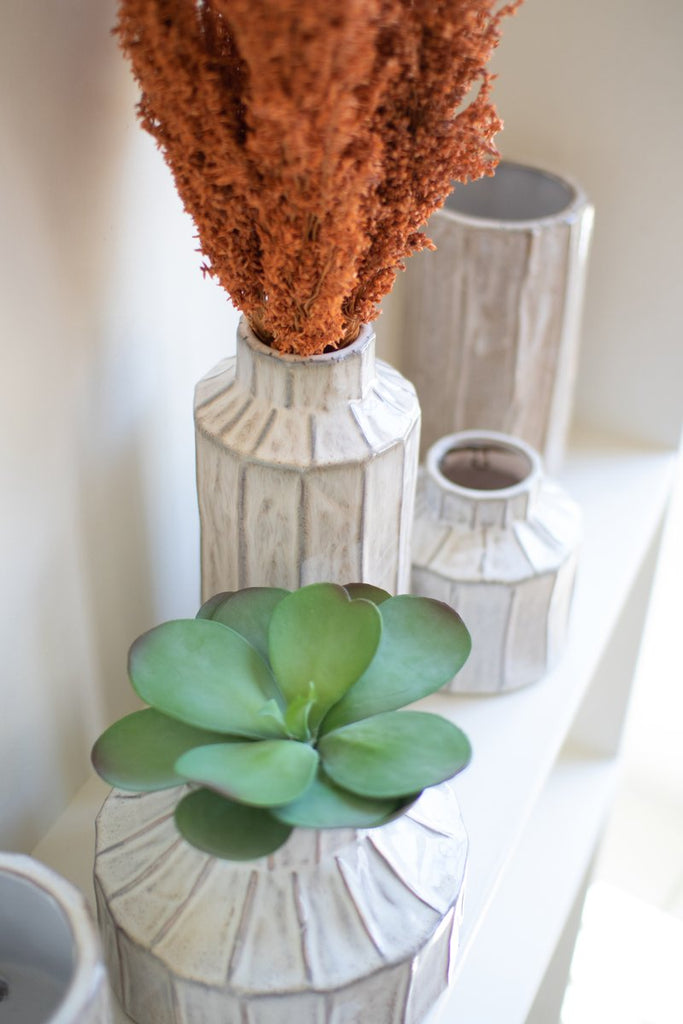 SET OF FIVE WHITE CERAMIC PLANTERS