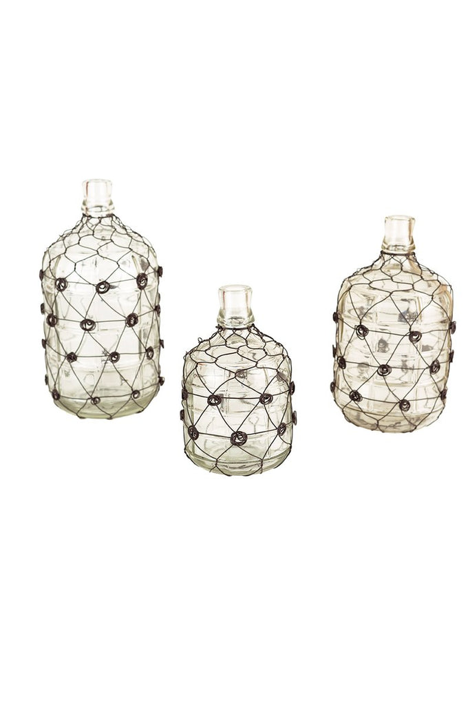 SET OF THREE WIRE WRAPPED CLEAR GLASS JUGS