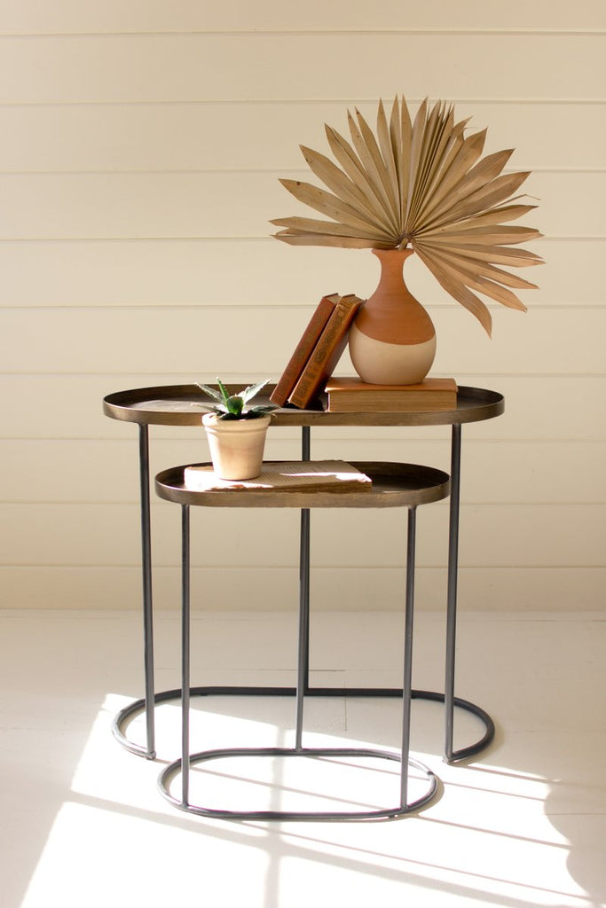 SET OF TWO OVAL ANTIQUE BRASS ACCENT TABLES