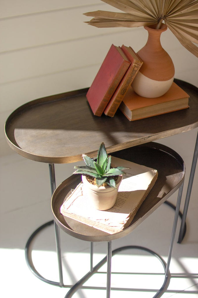 SET OF TWO OVAL ANTIQUE BRASS ACCENT TABLES