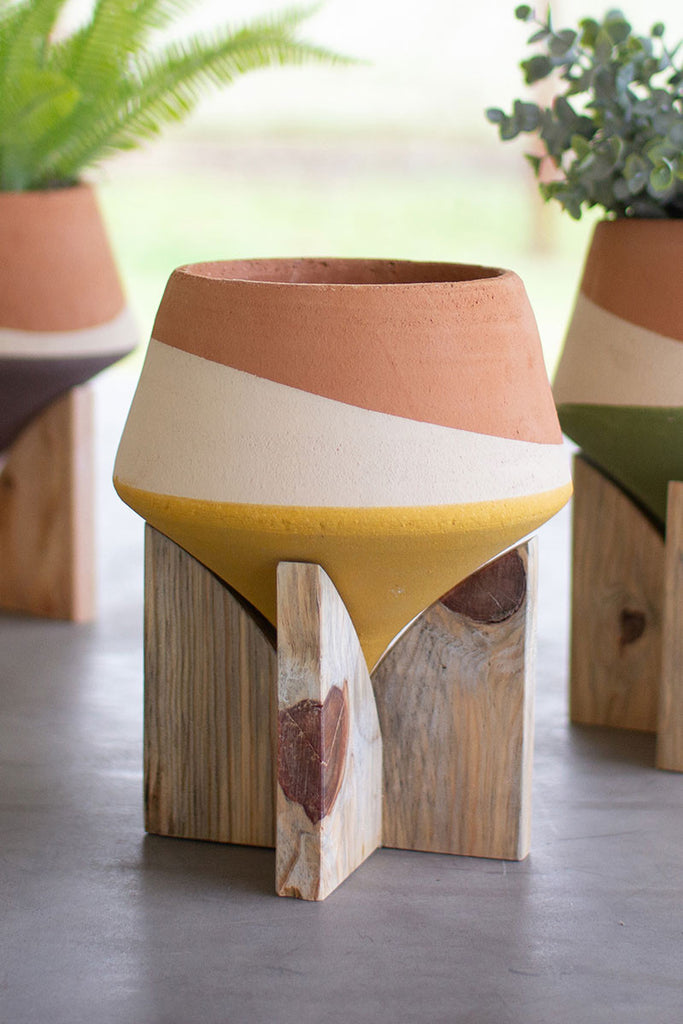 SET OF THREE DOUBLE DIPPED CLAY VASES ON WOOD BASES