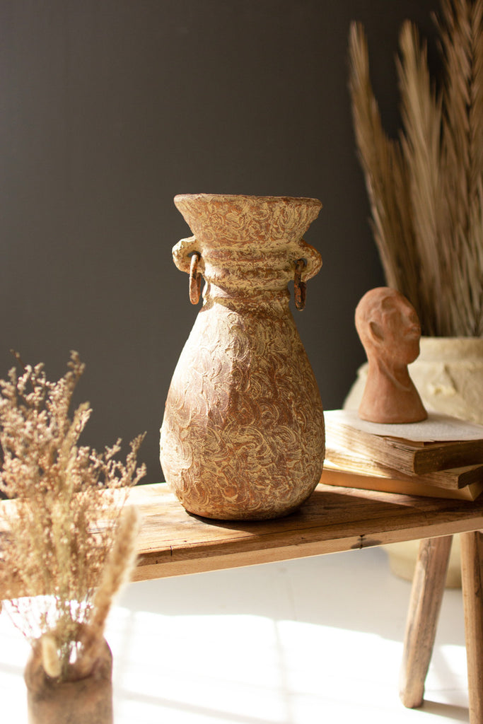 TALL ANTIQUED CLAY URN WITH METAL RINGS