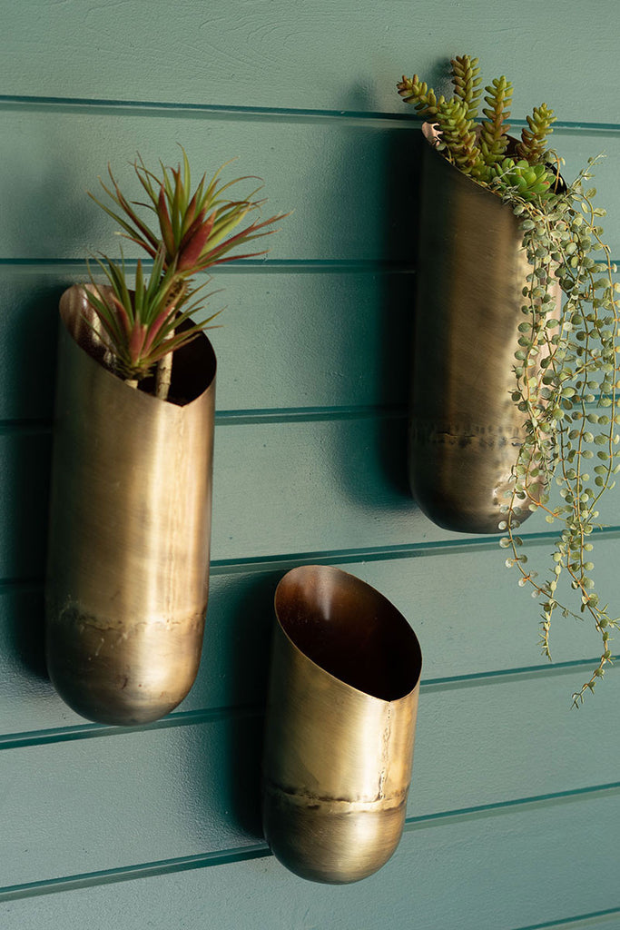 SET OF THREE ANTIQUE BRASS WALL VASES